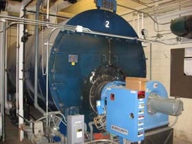 Industrial boiler system with blue tank and mechanical equipment