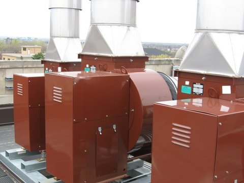 Rooftop ventilation and exhaust equipment on a commercial building